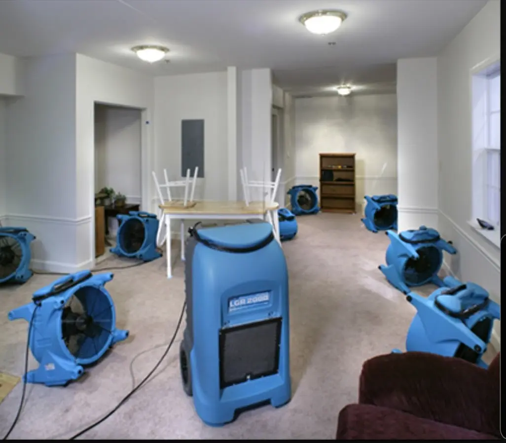 Air movers and dehumidifier setup for Water Damage Restoration in Draper
